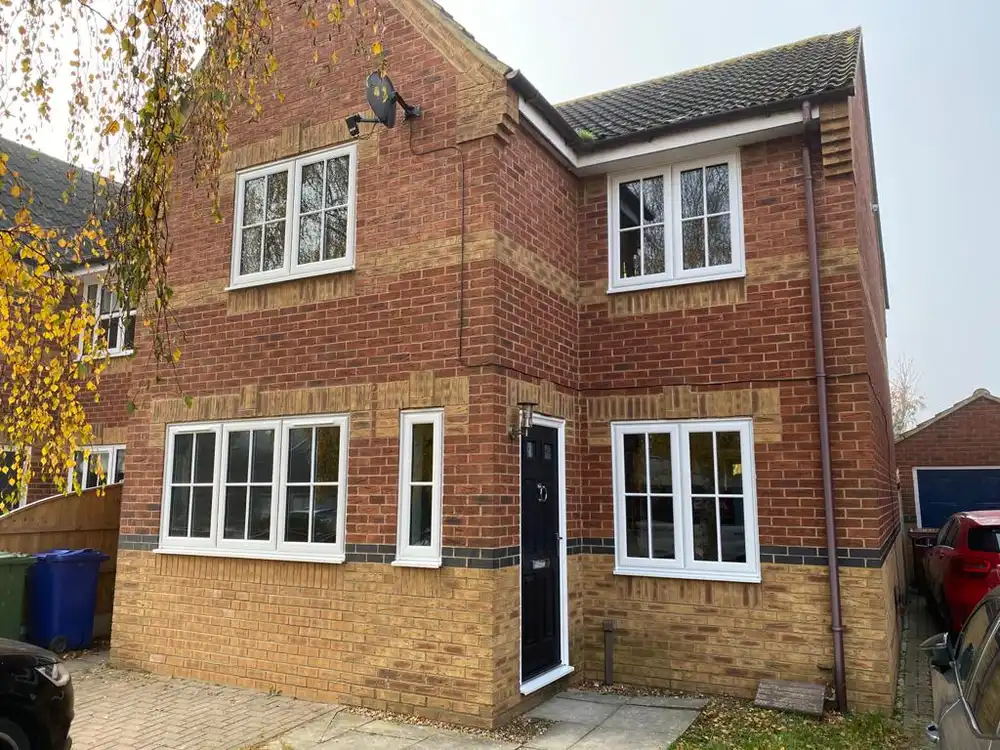house with white casement windows